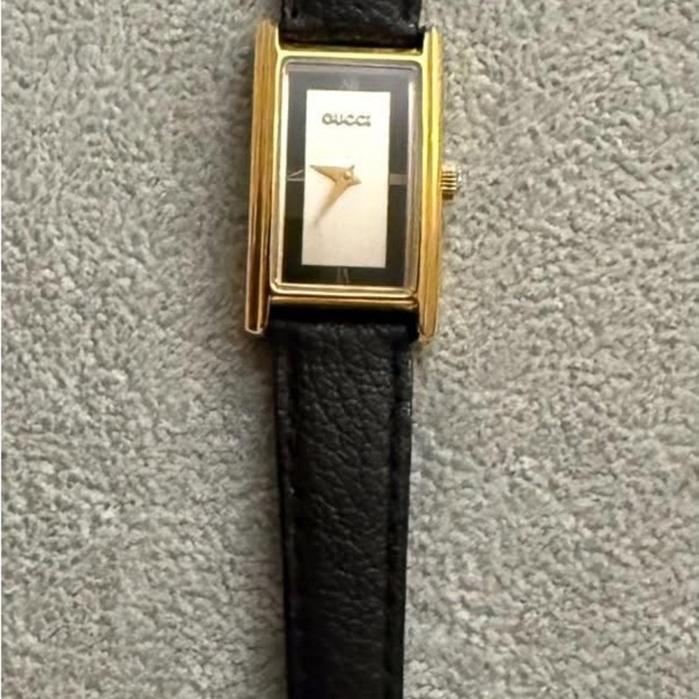 Gucci Gold Watch with Black Strap